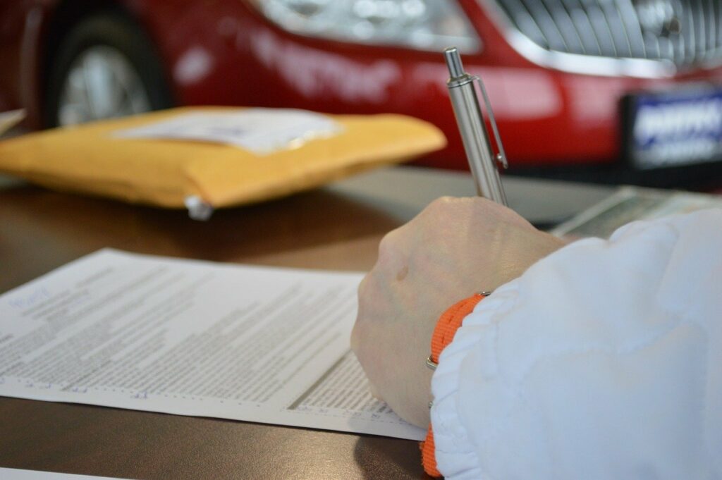 A person signing a document