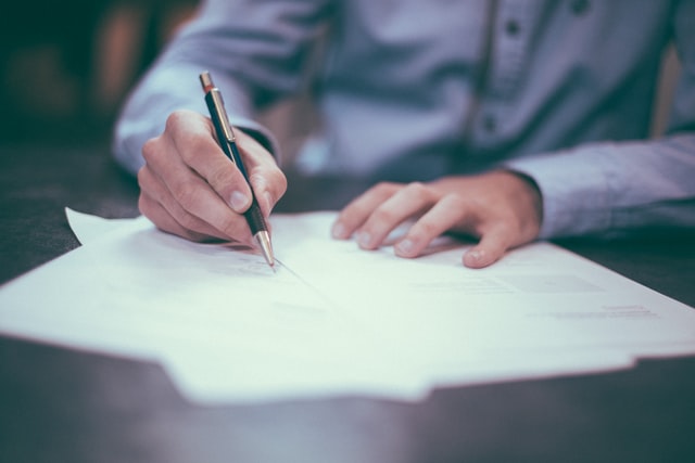 A person signing documents